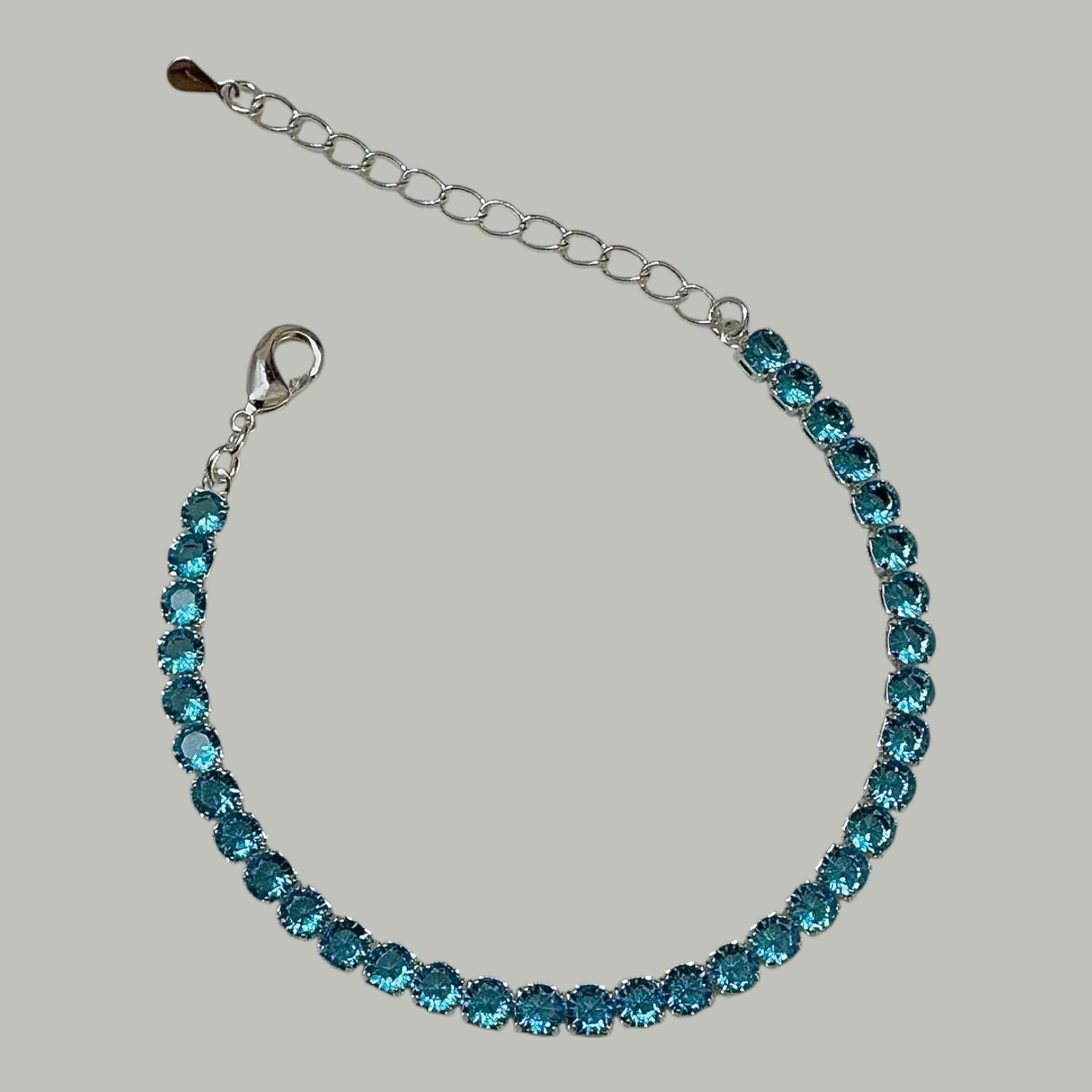 PULSEIRA RIVIERA ZIRCÔNIAS AZUL BANHO DE PRATA